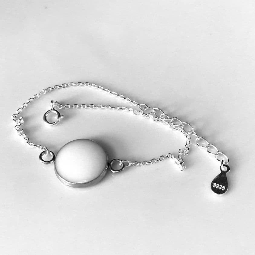 Bracelet with breast milk pendant