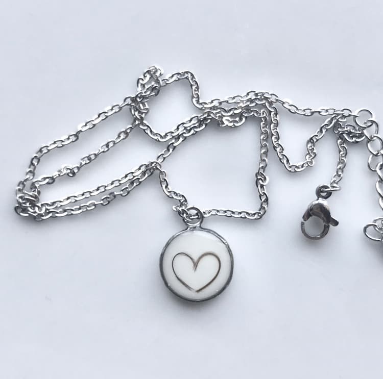 Necklace with breast milk and baby hair pendant