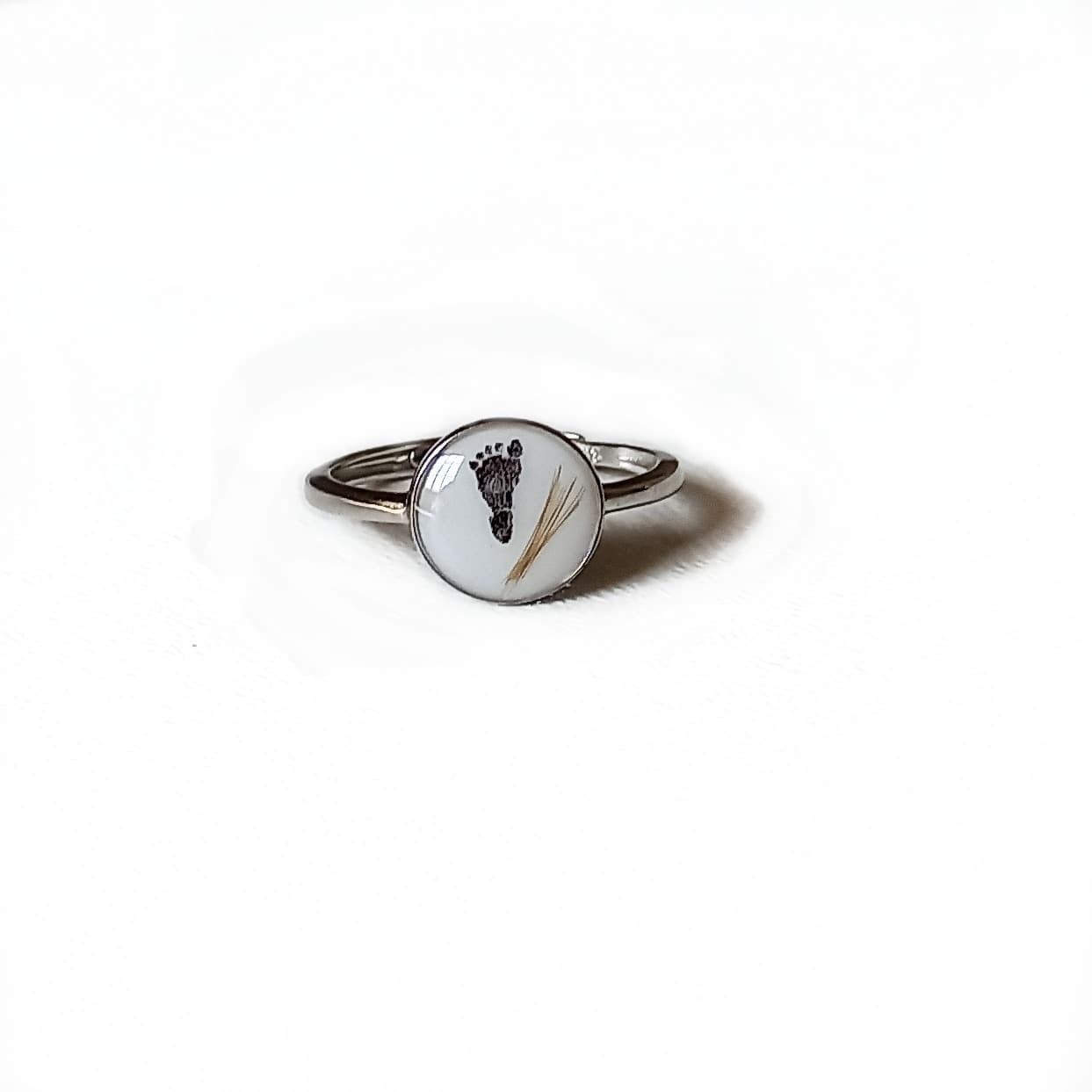 Circular ring with breast milk, footprint & baby hair