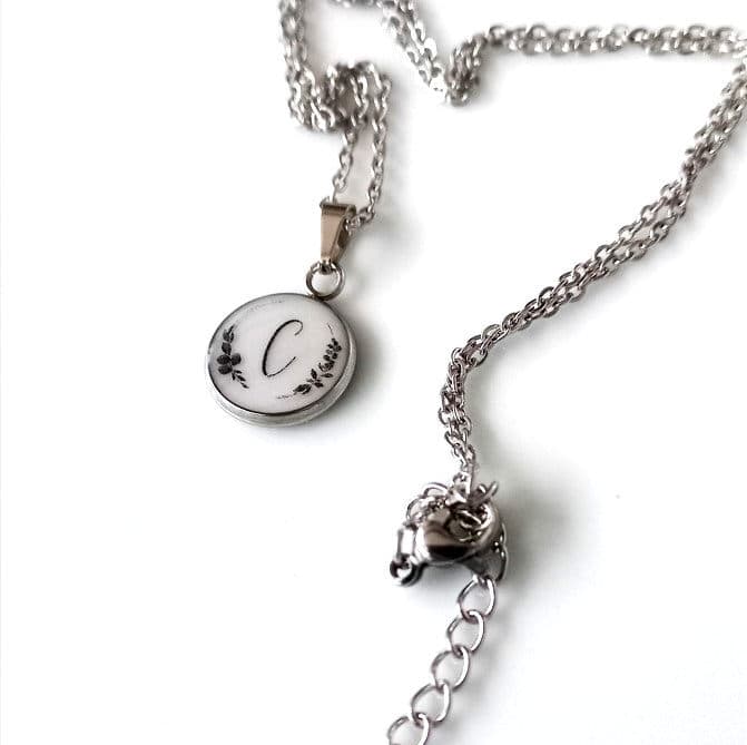 Necklace with breast milk & a floral initial pendant